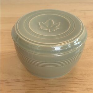 Dansk small round green ceramic jar with maple leaf lid